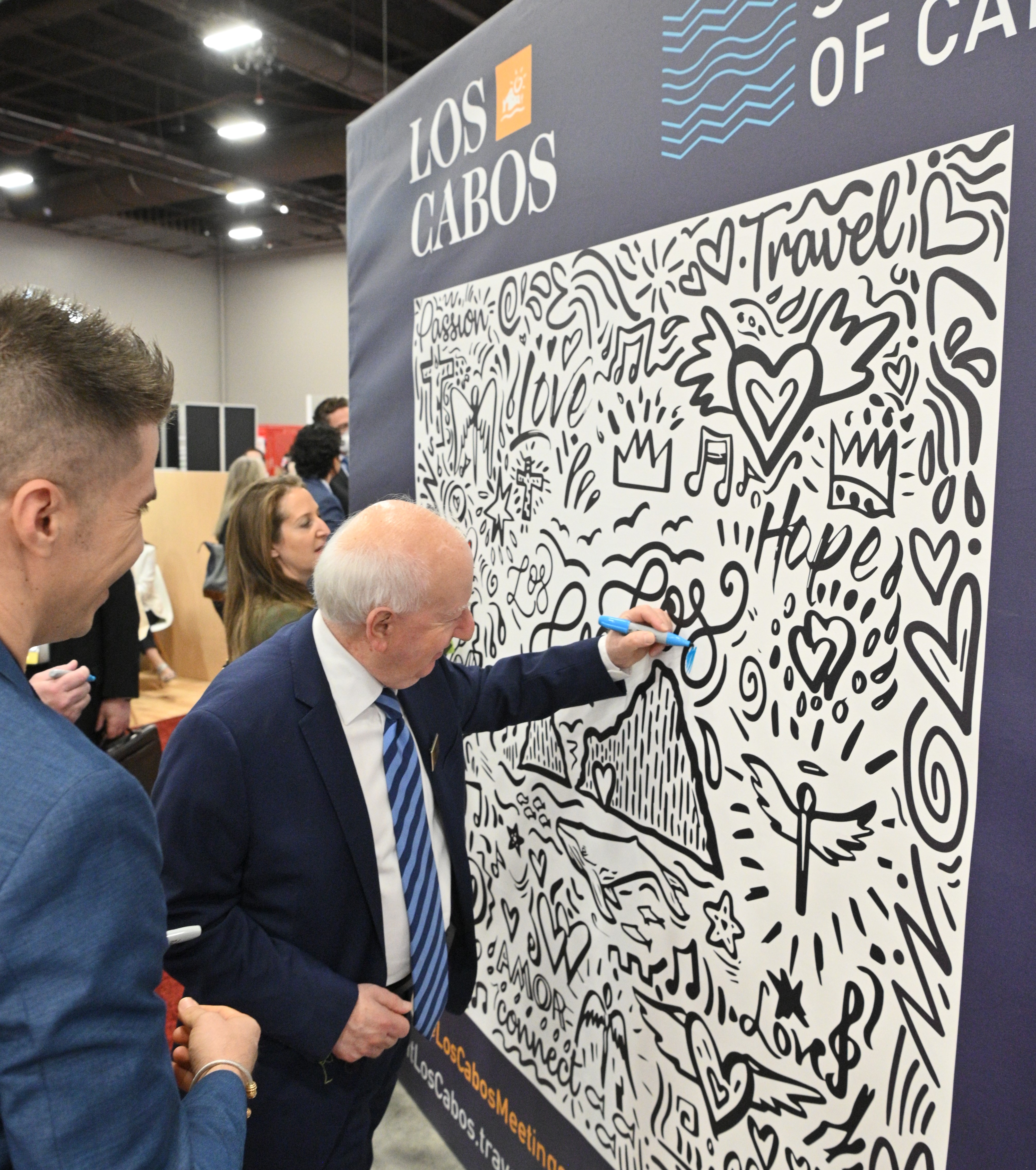 IMEX's Ray Bloom & Carina Bauer color the Los Cabos wall